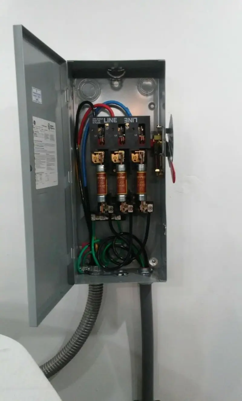 Three-phase disconnect switch installed for Smoke Detector Installation in Omak
